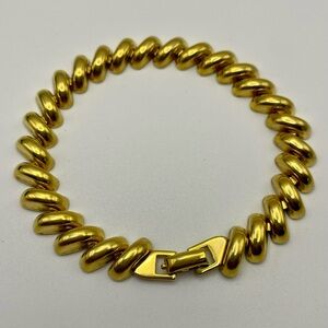 Twisted San Marco Link Bracelet. Gold Tone. 7 inches